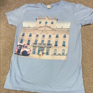 Melanie Martinez K-12 Light Blue Short Sleeve Graphic Tee with Building Print